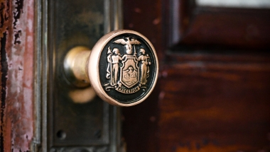 New York State seal embossed door knob in the capitol.  