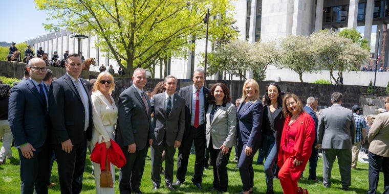 Senator Patricia Canzoneri-Fitzpatrick stands with Service Members Legislators