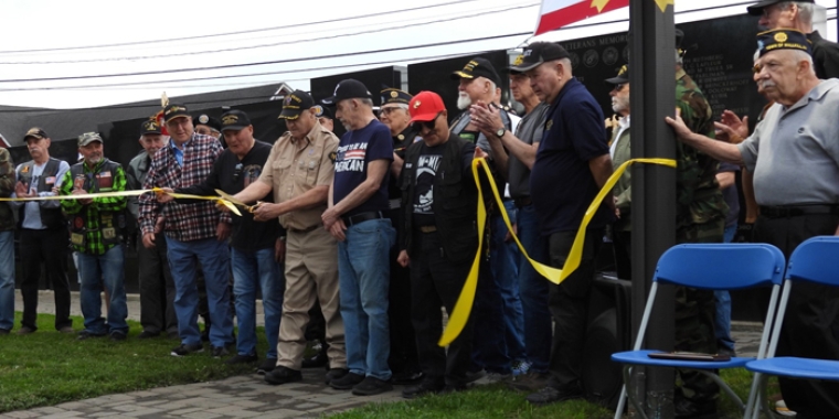 Mike Cody, middle, and others at dedication of Wallkill Vietnam Wall.