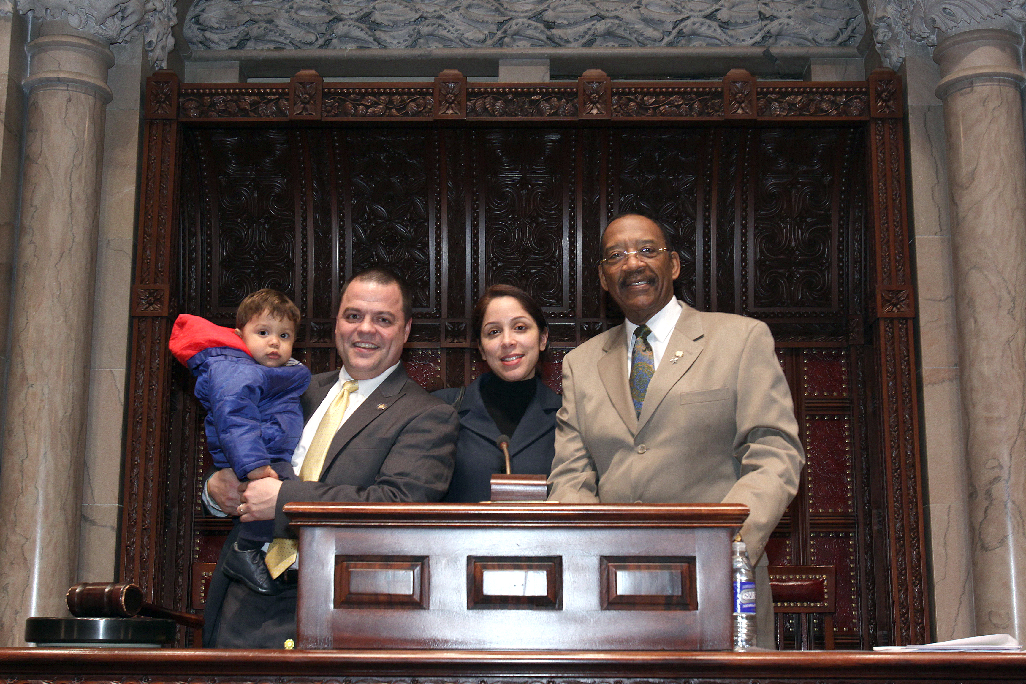 Assemblymember Luis Sepulveda with his son, Luis Enrique and his wife,  Elizabeth Sepulveda and Senator Rubén Díaz.