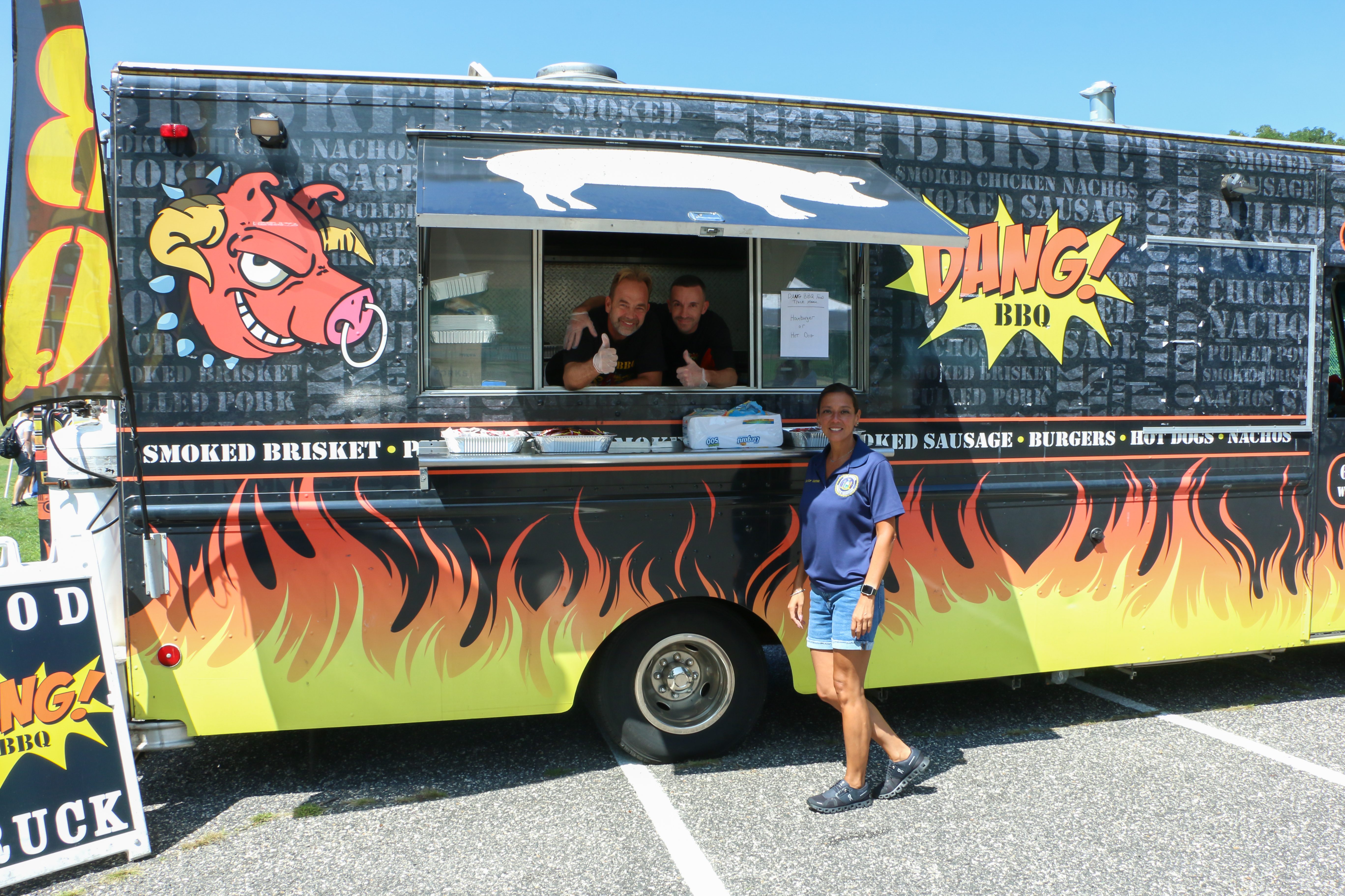 Photo of Senator Martinez with Dang BBQ truck during the 2023 end of summer celebration.