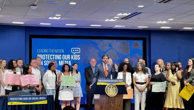 Senator Andrew Gounardes speaks to attendees at a press conference about his legislation to keep kids safe on social media.