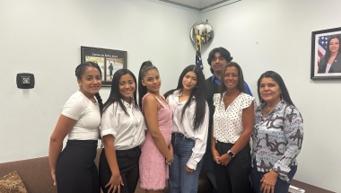 Photo: Members of the Teatro Yerbabruja theater company meet with New York State Senator Monica R. Martinez, who secured a grant to support the organization’s summer art and theater education programs. 