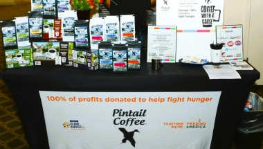 Photo of a Pintail Coffee company display table with products during a Senator Monica R. Martinez community event.