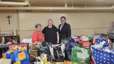 Senator Addabbo drops off food and personal care items with Nancy Baer and Tara Jackson Baer at Sacred Heart Pantry.