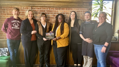 Senator Lea Webb Honors Lost Dog Cafe & Lounge with the New York State Senate Empire Award