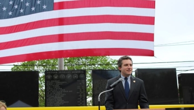 Senator James Skoufis speaks at the dedication of the Town of Wallkill's Vietnam Veterans Wall Memorial in May.