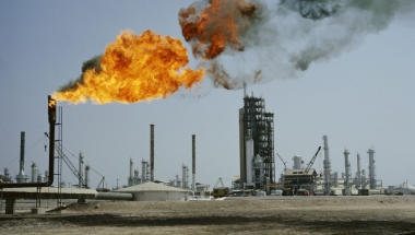 A refinery flares off waste gas