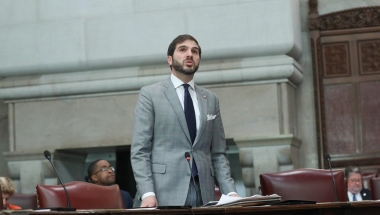 State Senator Andrew Gounardes standing in the Senate chamber