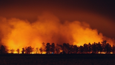 Photo image of actively burning wildfire. 