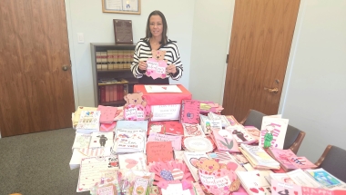 Photos of NYS Senator Monica R. Martinez with Valentine’s Day cards made for veterans and seniors by local school children.