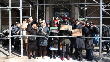 Elected officials and community emmbers stand in front of Lincoln Correctional Facility 