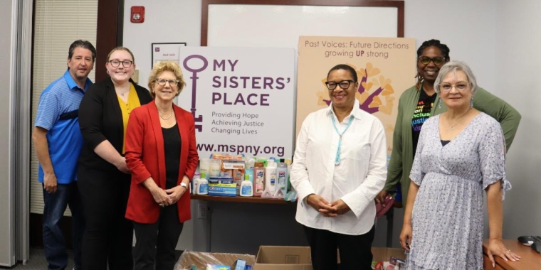 Sen. Shelley Mayer, her staff, and staff of My Sisters' Place pose with toiletry donations
