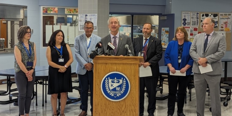 Senator Ryan speaking at a press conference at Kenmore West High School