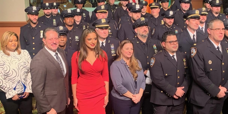 Senator Addabbo stands with honorees at the 106th Precinct Annual Medal Day Ceremony.