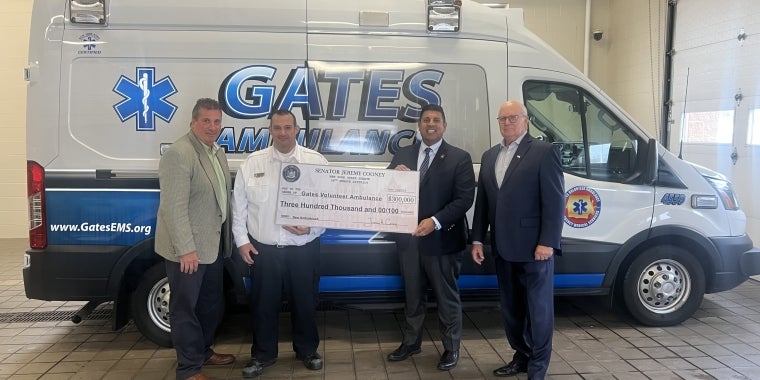 Senator Cooney Stands with Members of Gates Volunteer Ambulance Services Senator Cooney Stands with Members of Gates Volunteer Ambulance Services