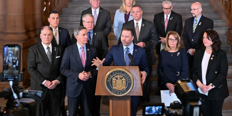 (Center behind podium: Senate Republican Leader Rob Ortt)