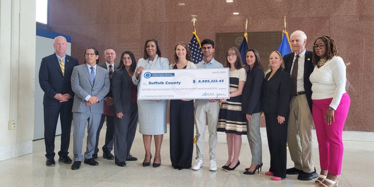 Senator Monica R. Martinez joins Attorney General Letitia James to present a check to Suffolk County officials to fund youth anti-vaping programs.