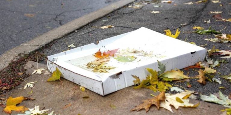 Pizza box on the ground