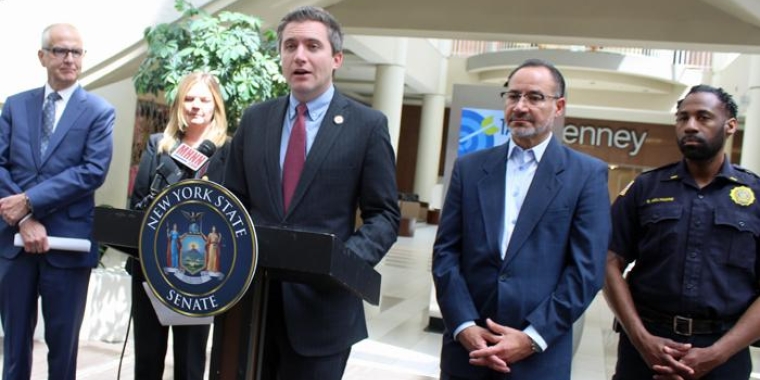 Senator James Skoufis, podium, discusses new anti-retail theft laws