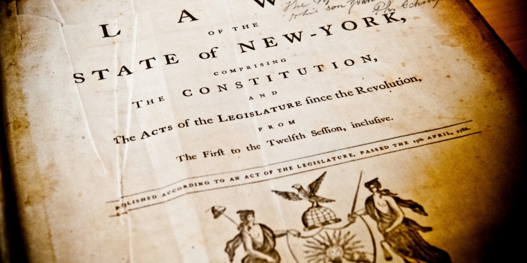 Photo of historical "Laws of New York" State book page