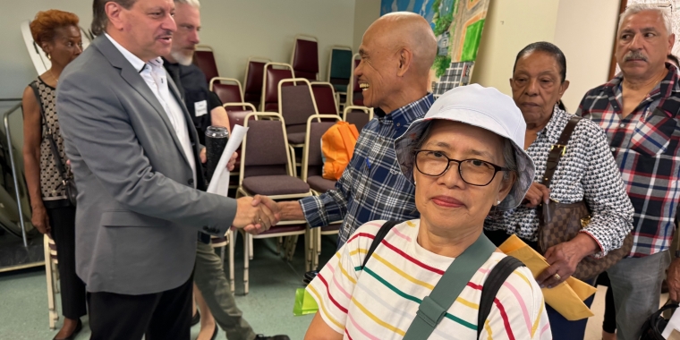 Senator Addabbo job greets a constituent at the job fair.