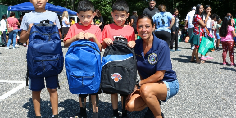 Photo from 2023 End of Summer BBQ of Sen. Martinez with children who attended the event.