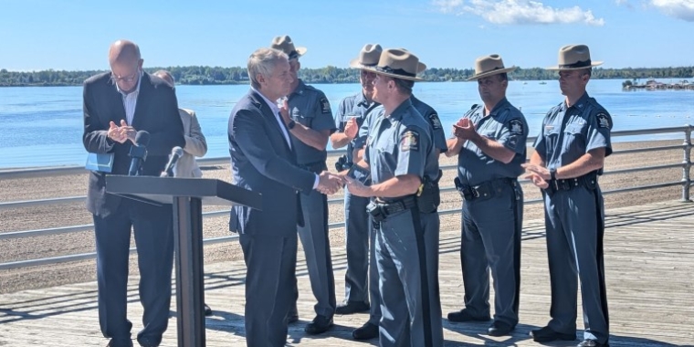 Senator Ryan presents Officer Nathan Sibenik with a NYS Senate Commendation Award