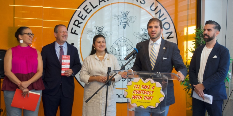 Senator Andrew Gounardes speaks at the Freelancers Union office with other elected officials.