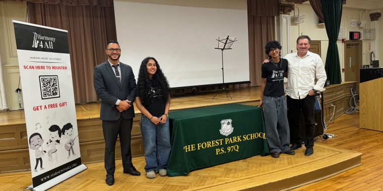 PS 97 Principal Yassine Aggoub, joins Bianca and Joshua Quddus of Harmony 4 All, and Senator Addabbo for a photo after the concert.