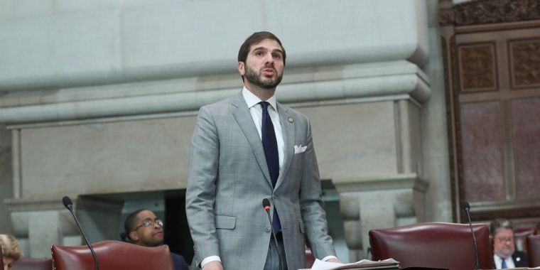 State Senator Andrew Gounardes standing in the Senate chamber