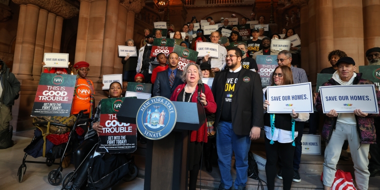 Sen. Krueger speaks at a press conference in the Capitol