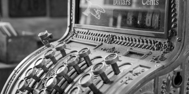 Photo of an antique cash register.