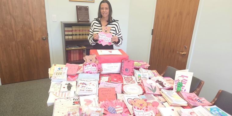 Photos of NYS Senator Monica R. Martinez with Valentine’s Day cards made for veterans and seniors by local school children.