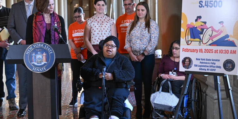 Constituent Shameka Andrews, wheelchair user and advocate, speaks at a press conference hosted by Senator Patricia Fahy introducing the Right to Repair Wheelchair legislation.