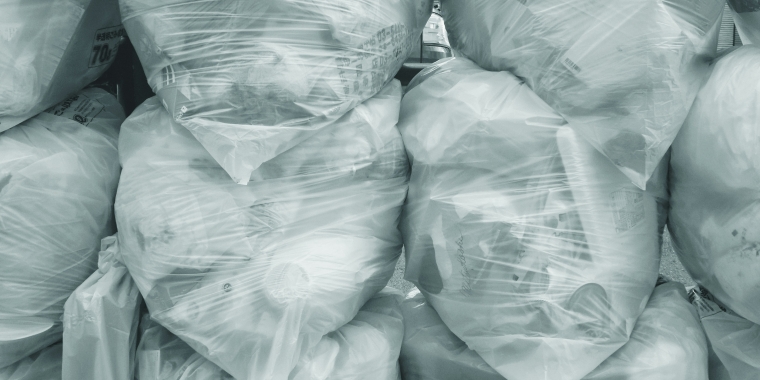 Photo image of bags of garbage.