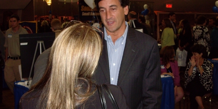 Senator Fuschillo speaks with a local small business owner during his 2008 Small  Business Expo