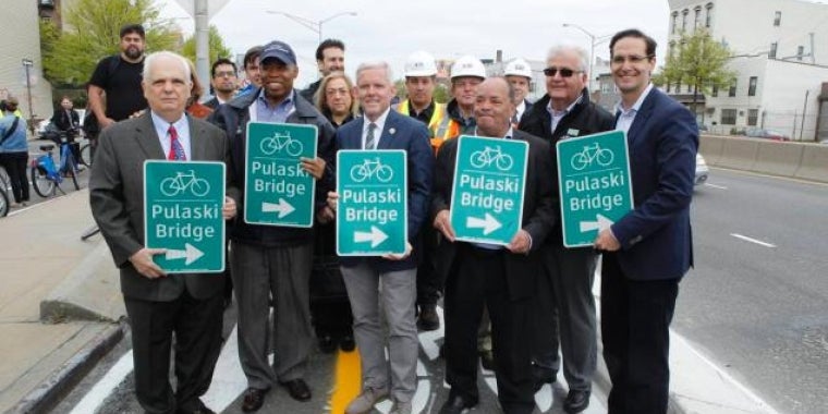 (From l.) Assemblyman Joseph R. Lentol, Brooklyn Borough President Eric Adams, City Council Majority Leader Jimmy Van Bramer, state Sen. Martin M. Dilan and Ryan Russo at the opening of the Pulaski Bridge Bikeway. -Kevin C. Downs/for New York Daily News