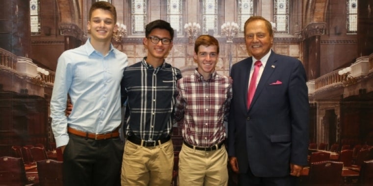 Senator Bonacic is pictured with (L-R); Valedictorian, Bryce Heller; Salutatorian, Sawyer Huang; and Honored Student, Brendan Bready.
