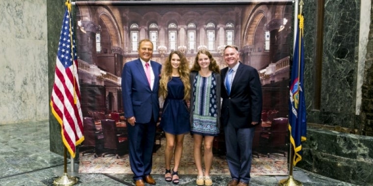 Senator Bonacic is pictured with (L-R), Salutatorian Katherine Mazur, Valedictorian Rachel Behrent and S.S. Seward Principal Michael Rheaume.