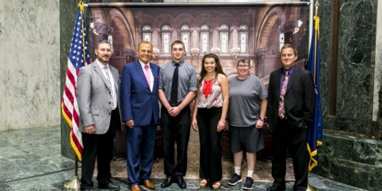 Pictured L-R is, Downsville Superintendent John Evans. Senator Bonacic, honored student Brady Gales, Valedictorian Jewel Alston and her mother Rhonda Liddell, and Downsville Principal Tim McNamara
