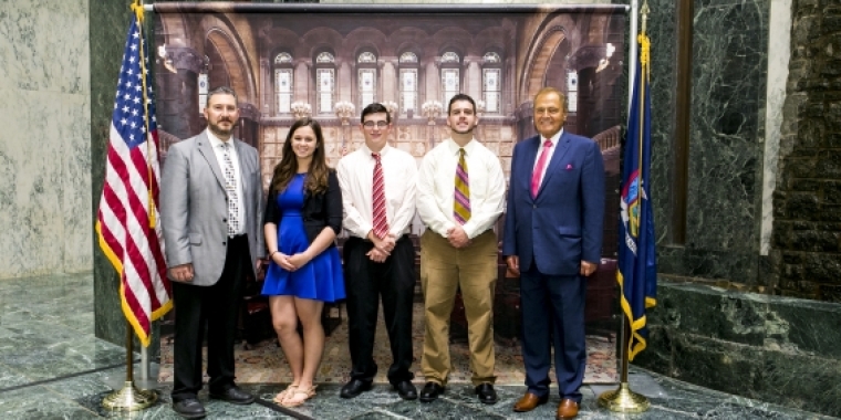 Pictured L-R is, Superintendent John Evans, Honored Student Dakota Rogers, Salutatorian Jeremy Johaneman, Valedictorian Khristopher DiBartolo and Senator Bonacic.