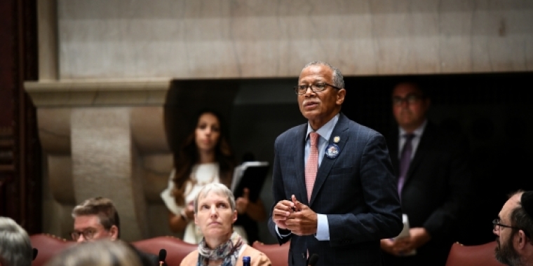 Senator Jackson in a candid moment on the Senate floor with Aging Committee Chair Senator Rachel May