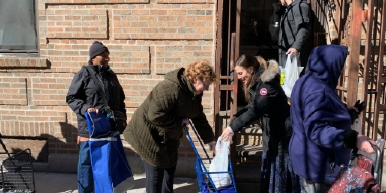 Senator Biaggi helps give residents non-perishable foods