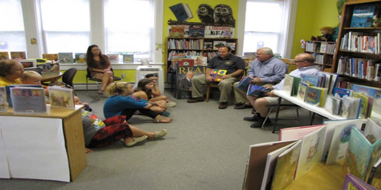 From left to right: Assemblyman Palmesano, Senator O'Mara, and former Steuben County Legislator Pat McAllister join the Addison Public Library summer reading program on Thursday, July 13.