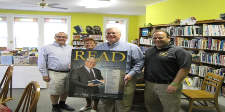 Senator O'Mara and Assemblyman Phil Palmesano (far right) recently joined former Steuben County Legislator Pat McAllister (far left) and Addison Public Library Director Lori Patterson at the library's weekly summer reading program.