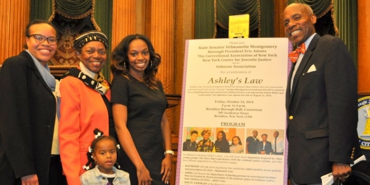 Senator Montgomery Celebrates the Passage of Ashley's Law with Ashley Duncan, the young person who inspired the law, and her family. Senator Montgomery Celebrates the Passage of Ashley's Law