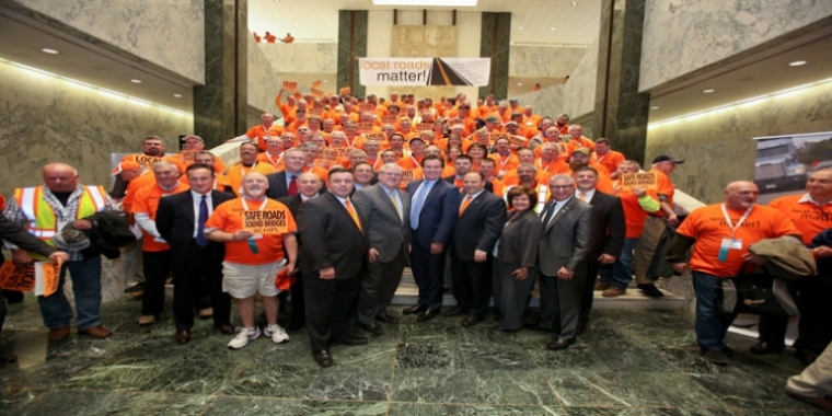 In the photo above from the March 8th “Local Roads Matter” support rally in The Well of the Legislative Office Building, from left to right in the center of the front row: Senator O'Mara, Senate Majority Leader John Flanagan and Assemblyman Palmesano join legislative colleagues and local highway superintendents and highway department employees from every region of New York State.