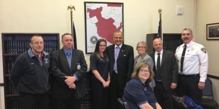 Pictured with Senator Bonacic are (L-R), Steve Emerson, John Mauro, Becky Turck, Heidi Stack (seated), Teresa Hamilton, Malcolm Dean, and George Dean.