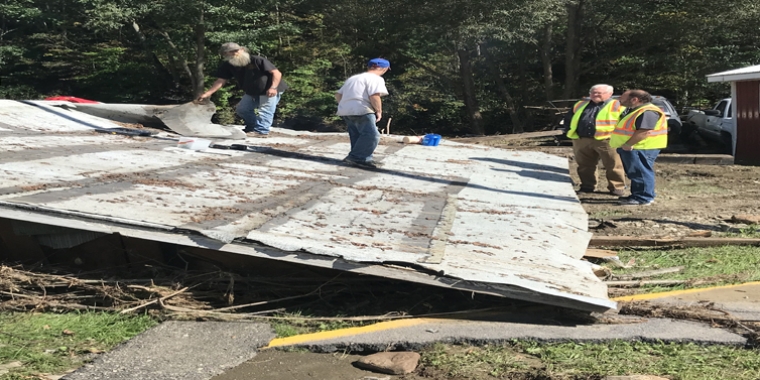 Senator O'Mara and Assemblyman Palmesano survey last summer's flooding damage.